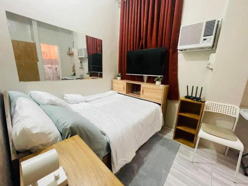 Cozy 1BR Unit with Full Bathroom,Kitchen, Wifi at Sonia's Island Stay