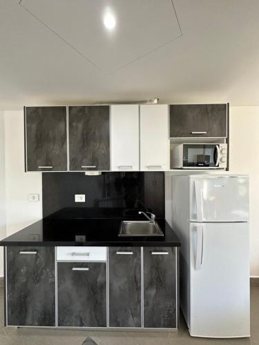 Cozinha, Grey Escape Apartments in Hraiche