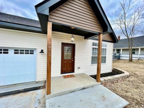 Beautiful NEW Ranch Home with a large deck and games