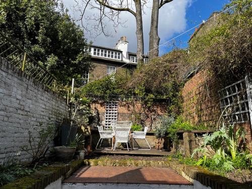 Comfy child/dog friendly garden flat heart Camden