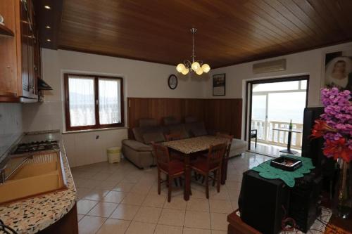 Three-Bedroom Apartment with Terrace and Sea View