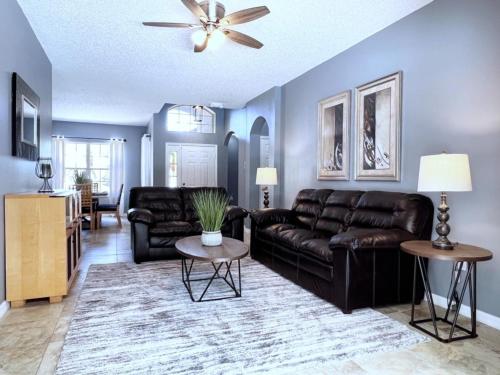 Privacy 4 Bed 3 Bath Pool Home with Spa home in Kissimmee, USA
