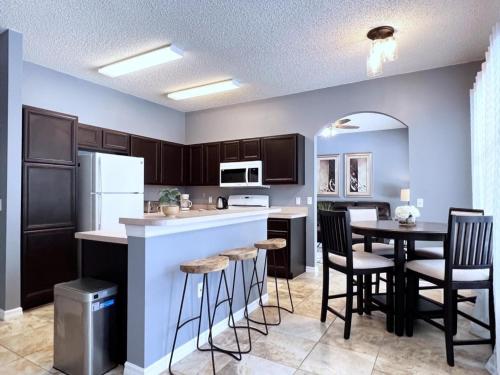 Privacy 4 Bed 3 Bath Pool Home with Spa home in Kissimmee, USA