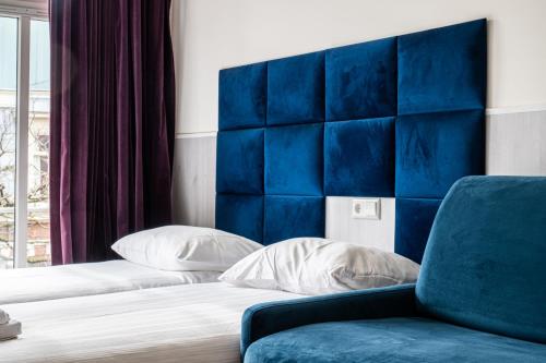 Standard Triple Room with Private Bathroom room in Hotel Kap City Centre