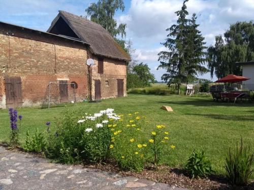 Granary - house by the pond