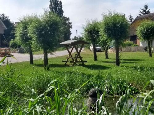 Granary - house by the pond