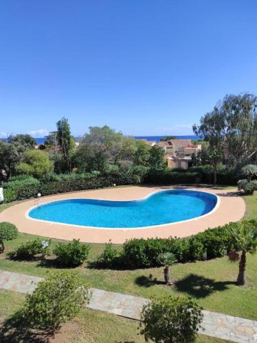 Appartement de 2 chambres a Linguizzetta a 200 m de la plage avec piscine partagee terrasse amenagee et wifi - Location saisonnière - Linguizzetta