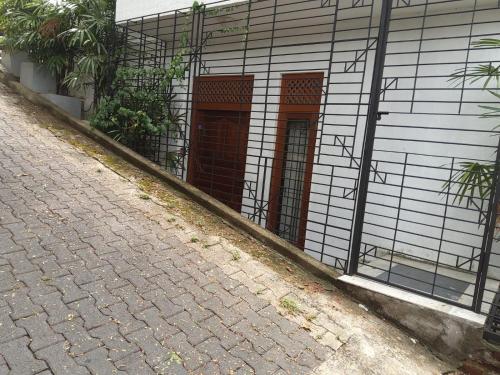 Comfortable and serene cottage surrounded with palms and tamarind tree