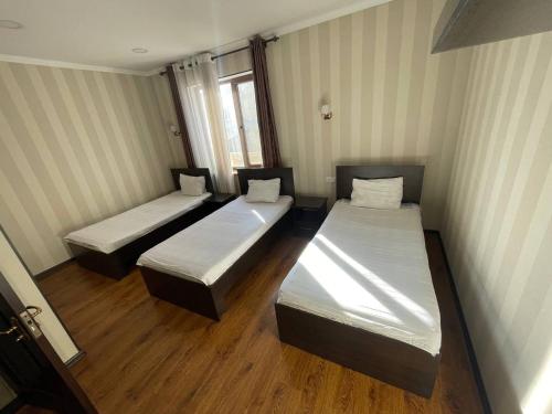 Guest House VOYAGE Karakol - Tap to explore photos