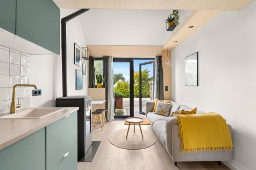 Exterior view of Romantisch huisje met houtkachel & airco op 2,5km van zee