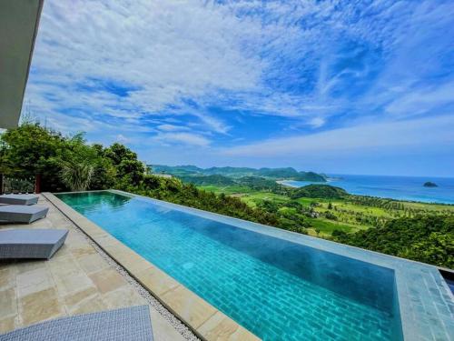 Ocean Wave Lombok - 4 BR infinity pool villa – khách sạn tại Selong Belanak