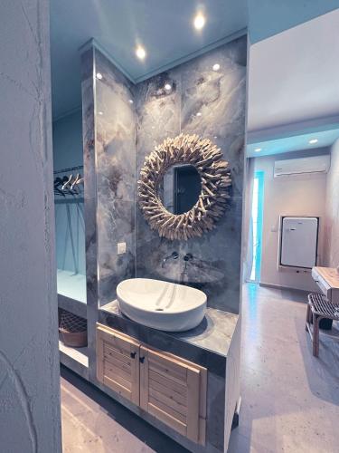 Delfini Beach Hotel & Suites Delfini Beach Hotel & Suites