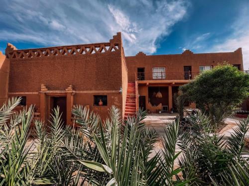 Skats, Dar Talmoudi ,Traditional Riad, Local Food, Camel , Desert Excursions in Tagounite