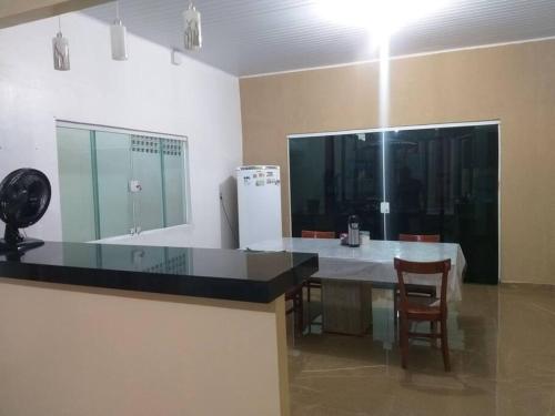 Casa confortável e bem localizada