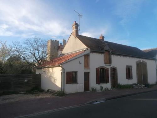 Maison entre ville et campagne