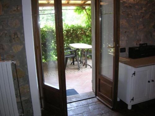 Ferienwohnung in Castellina Marittima mit Grill und Garten