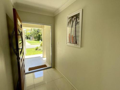 Trinity Beach Haven - Luxury 4 Bedroom Home with Pool, Steps to the Beach, Surrounded by Mountains - Tap to explore photos