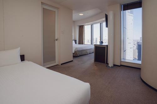 Deluxe Triple Room with 1 King Bed and 1 Sofa Bed - Non Smoking - Above 27th floor