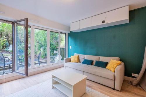 Appartement design avec jardin privatif, París