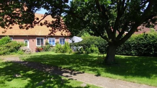 Appartement in Osterbruch mit Grill, Terrasse und Garten
