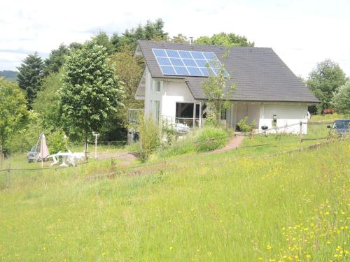 Holiday home with beautiful view on the village