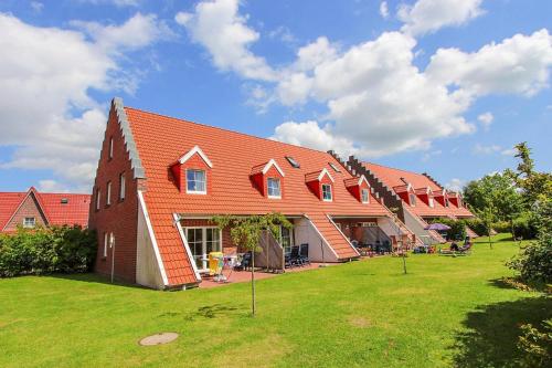 Apartment in Burhave with a shared pool