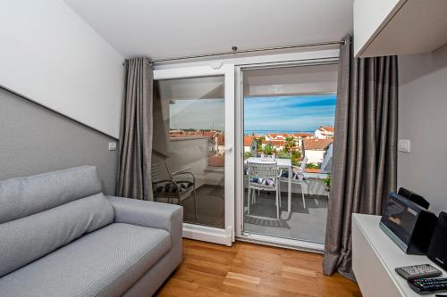 One-Bedroom Apartment with Balcony and Sea View