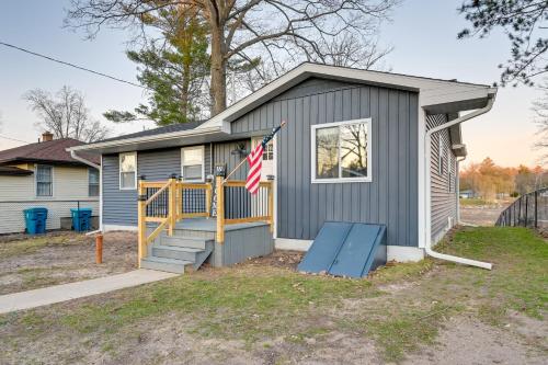 Riverfront Michigan Cottage with Fire Pit and Kayaks!