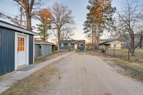 Riverfront Michigan Cottage with Fire Pit and Kayaks!