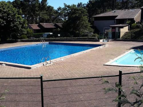 Maison d'été familiale, piscine dans la résidence - Location saisonnière - Lacanau