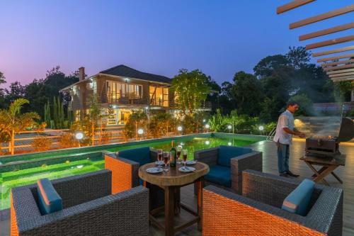 Coffee & Mist Luxury Villa- Comp Breakfast, Pool, Lounge, and Coffee Estate by StayVista