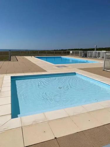 Appartement d'une chambre a Guidel a 100 m de la plage avec vue sur la mer piscine partagee et balcon amenage - Location saisonnière - Guidel