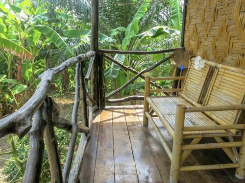 Balcony/terrace, Seaside Sanctuary Bungalows near Diamond Cliff Beach