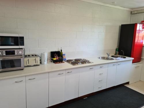 Cocina, Orchard 2 Bedroom Apartment in Devonport in Devonport
