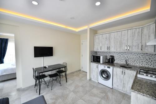 ห้องครัว, Lamira Apart Holiday&Guest House in กุนลุกบาซี