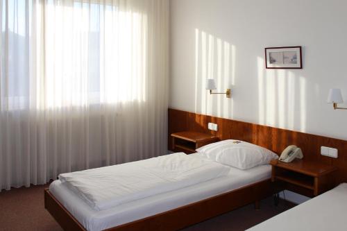 Hotel La Taverna in Rosbach vor der Höhe, Deutschland