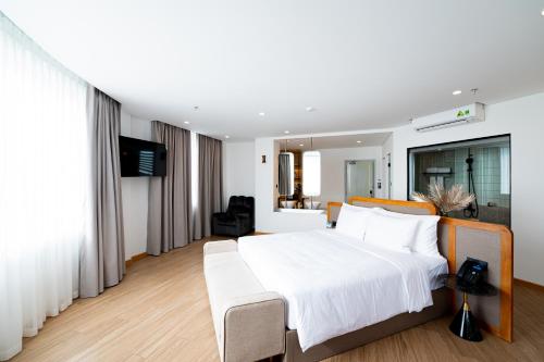 PĀMA Boutique Hotel & Bistro Danang - 공용 라운지/TV 시청 구역