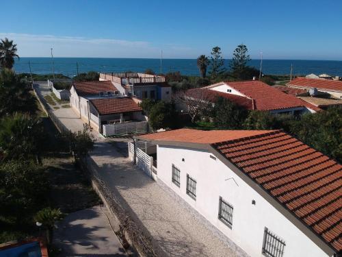 Edoné, Wohnung mit Blick auf einen Sandstrand