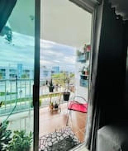 Pothos Beach PH 3BR Apt w Rooftop w Pool Access in Isabela