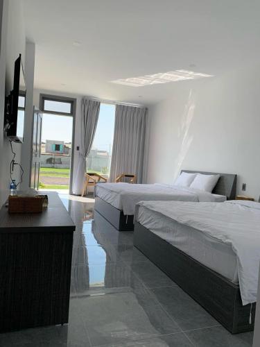 Shared lounge/TV area, Sea Breeze Homestay - Phuoc Hai in Phuoc Hai Beach