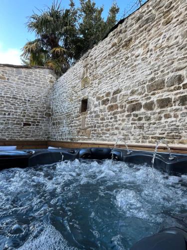 Maison en pierre avec jacuzzi - Location saisonnière - Caen