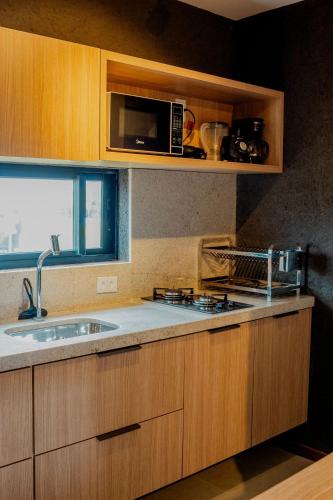 virtuve, Condomínio Gamboa Patacho a 190 da praia na Rota dos Milagres (Condominio Gamboa Patacho a 190 da praia na Rota dos Milagres) in Porto De Pedras