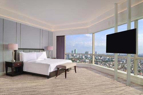 Junior King Suite with Skyline View - Executive Lounge Access room in JW Marriott Hotel Surabaya