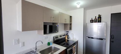 Kitchen, Apartamento Parada 50 in Zone 12