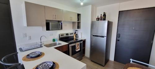 Kitchen, Apartamento Parada 50 in Zone 12
