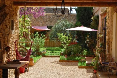 La Bucolique, Chambres et Jardin d'Hôtes - Chambre d'hôtes - Sabran