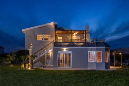 Coral Paradise Luxury Modern Family Villa with Jacuzzi, Pool View & Parking in Rhodes Island 1