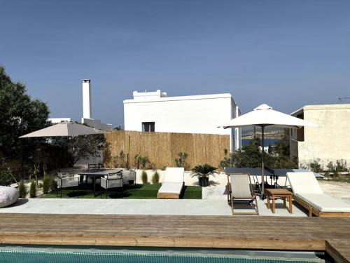 Minimal Grey Apartment Pool-front in Paros