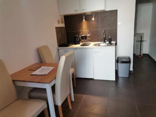 Apartmani Omišalj (Apartmani Omisalj) in Omišalj