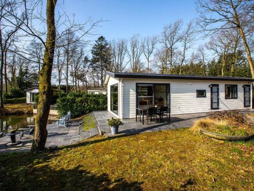 Modern chalet with two terraces and near a pond